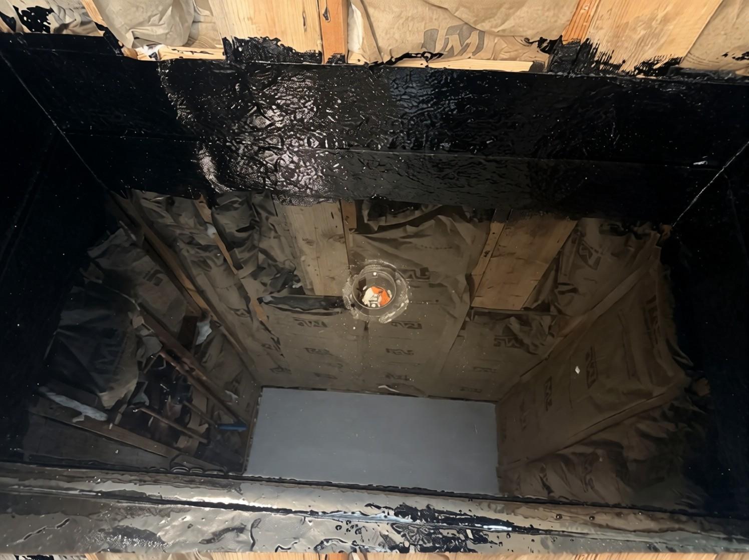 Hot-mop shower pan around the new drain